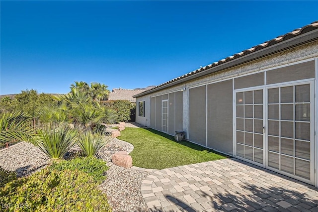 2372 Perrysburg Dr, Henderson, NV 89044 - view of grassy yard with a patio area