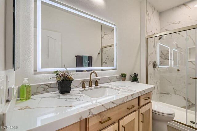 2372 Perrysburg Dr, Henderson, NV 89044 - full bath with toilet, vanity, and a marble finish shower