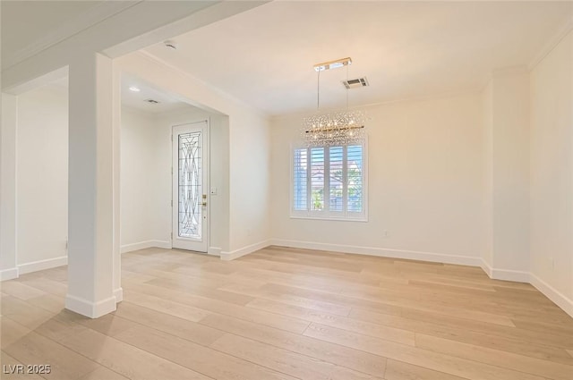 2372 Perrysburg Dr, Henderson, NV 89044 - spare room featuring a chandelier, light wood finished floors, baseboards, and ornamental molding