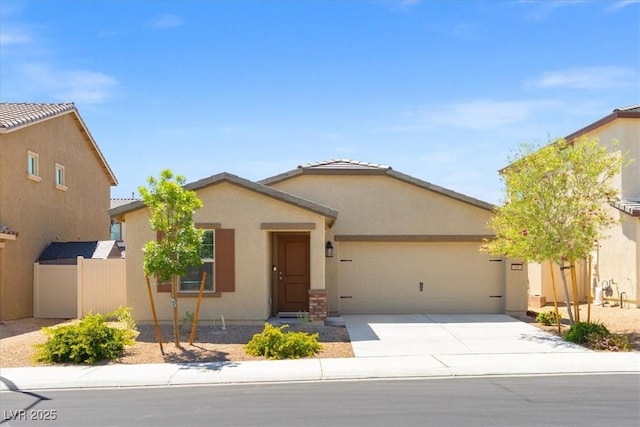 13 Deseo Ct, North Las Vegas, NV 89031 - ranch-style home with a garage, stucco siding, fence, and concrete driveway
