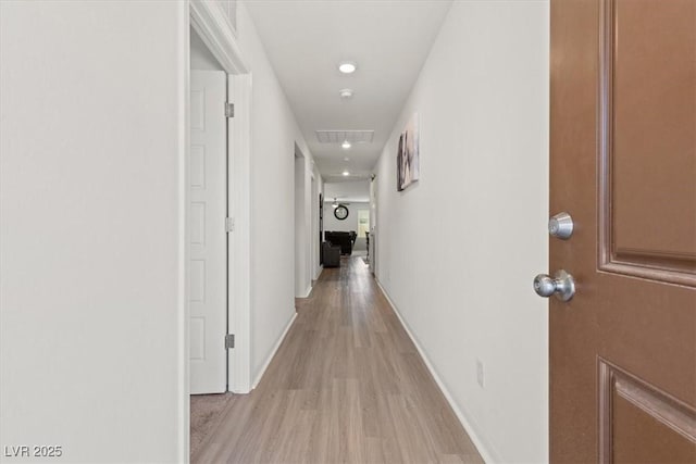 13 Deseo Ct, North Las Vegas, NV 89031 - hallway with recessed lighting, baseboards, attic access, and light wood-type flooring