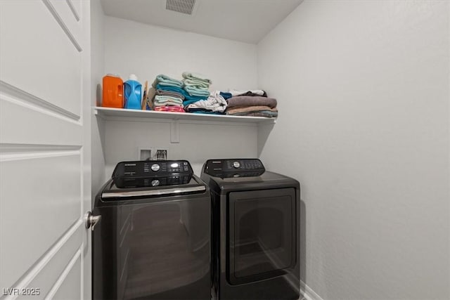 13 Deseo Ct, North Las Vegas, NV 89031 - washroom with laundry area, separate washer and dryer, baseboards, and visible vents