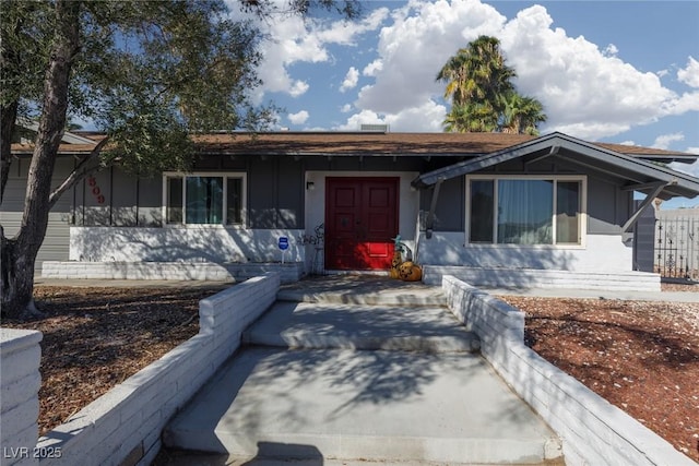 ranch-style home with stucco siding