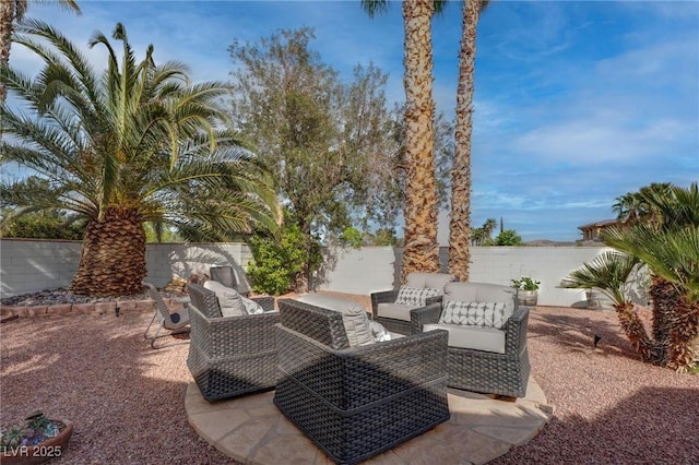 4594 Blue Mesa Way, Las Vegas, NV 89129 - view of patio with a fenced backyard and an outdoor living space