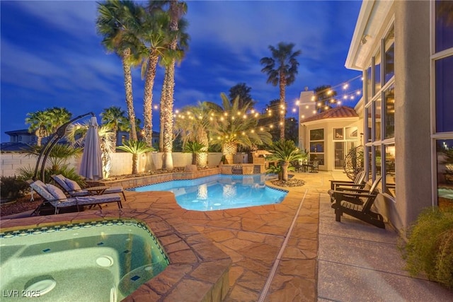 4594 Blue Mesa Way, Las Vegas, NV 89129 - pool at twilight featuring a fenced in pool, a fenced backyard, an in ground hot tub, and a patio area