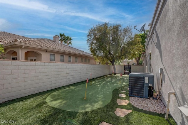 4594 Blue Mesa Way, Las Vegas, NV 89129 - view of yard with cooling unit and a fenced backyard