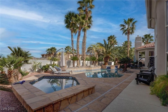 4594 Blue Mesa Way, Las Vegas, NV 89129 - view of swimming pool featuring a fenced in pool, a fenced backyard, a patio area, and an in ground hot tub