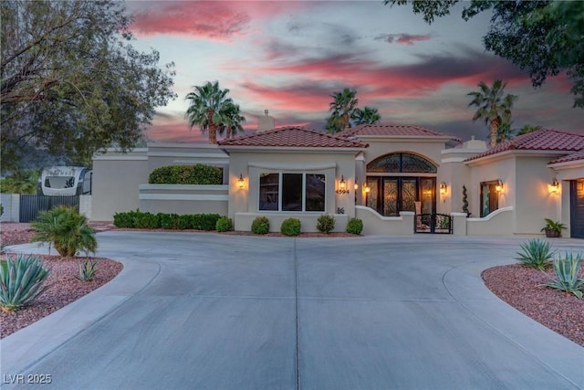 4594 Blue Mesa Way, Las Vegas, NV 89129 - exterior space with fence and curved driveway