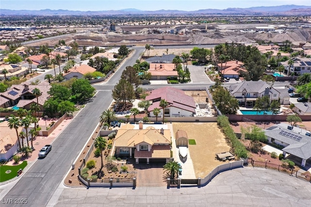 bird's eye view with a residential view and a mountain view