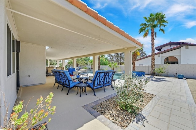 view of patio with a fenced in pool, a fenced backyard, and outdoor dining space