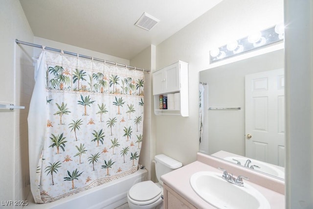 full bath with vanity, shower / bath combo with shower curtain, toilet, and visible vents