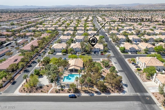 bird's eye view featuring a mountain view and a residential view