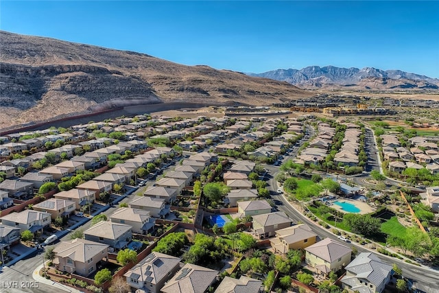 birds eye view of property with a residential view and a mountain view