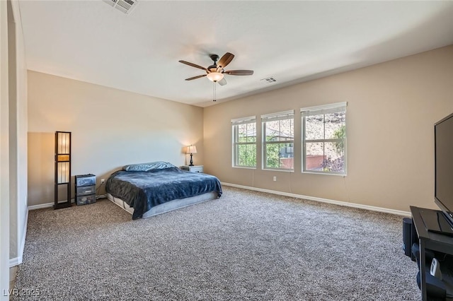 bedroom featuring baseboards, carpet flooring, and visible vents