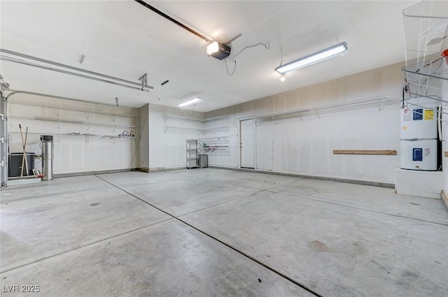 garage with a garage door opener and heating unit