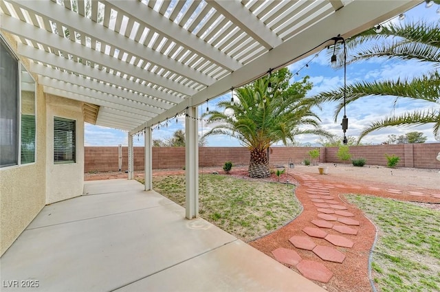 view of patio featuring a pergola and a fenced backyard