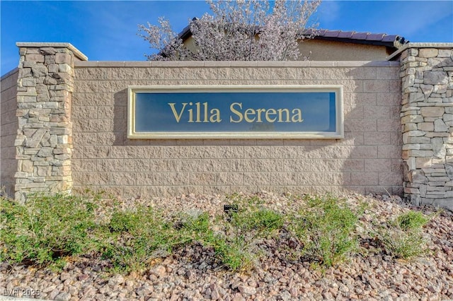 view of community sign