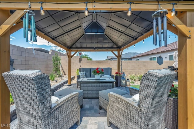 6325 Gambetta St, Las Vegas, NV 89115 - view of patio / terrace featuring an outdoor hangout area, a gazebo, and a fenced backyard