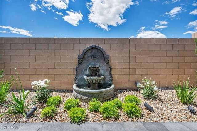 6325 Gambetta St, Las Vegas, NV 89115 - details featuring fence and a wood stove