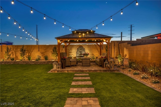 6325 Gambetta St, Las Vegas, NV 89115 - view of yard featuring a patio, a gazebo, outdoor lounge area, and a fenced backyard