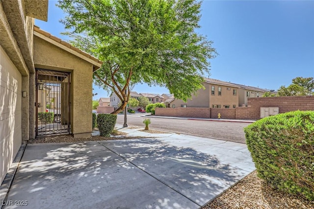 8091 Mosaic Sunrise Ln, Las Vegas, NV 89166 - view of patio with a residential view