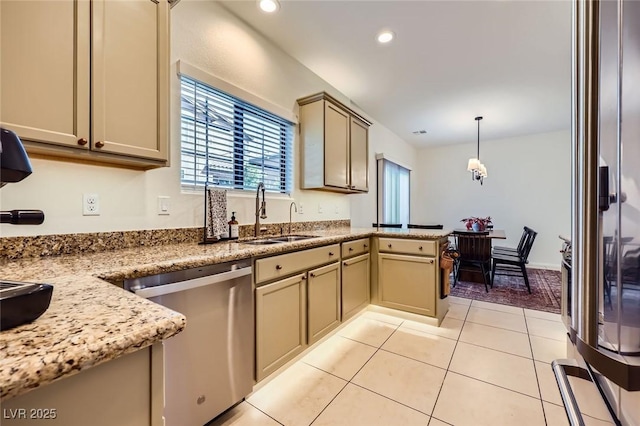 8091 Mosaic Sunrise Ln, Las Vegas, NV 89166 - kitchen featuring stainless steel dishwasher, light tile patterned floors, a peninsula, hanging light fixtures, and light stone counters