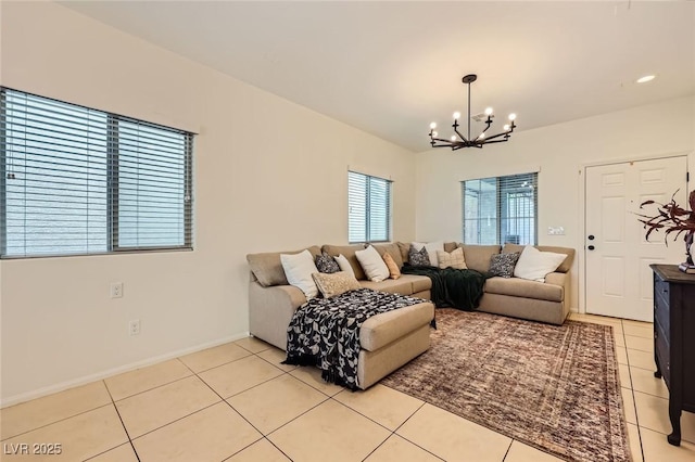 8091 Mosaic Sunrise Ln, Las Vegas, NV 89166 - living room featuring a chandelier and light tile patterned flooring