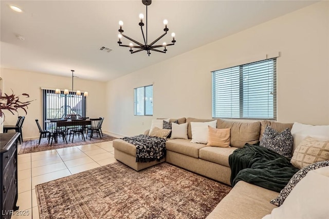 8091 Mosaic Sunrise Ln, Las Vegas, NV 89166 - living area featuring a chandelier and light tile patterned floors