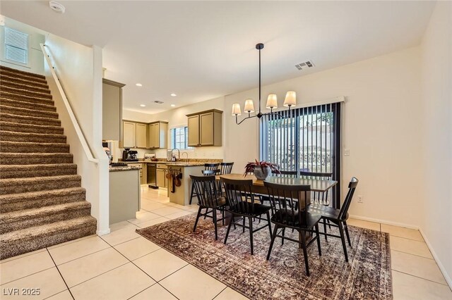 8091 Mosaic Sunrise Ln, Las Vegas, NV 89166 - dining space with a chandelier, stairway, light tile patterned floors, and recessed lighting