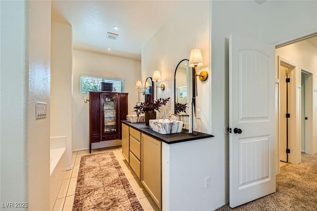 8091 Mosaic Sunrise Ln, Las Vegas, NV 89166 - bathroom with vanity, a bath, and tile patterned flooring