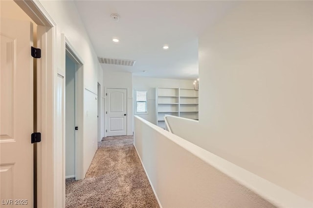 8091 Mosaic Sunrise Ln, Las Vegas, NV 89166 - hall featuring light carpet, an upstairs landing, and recessed lighting