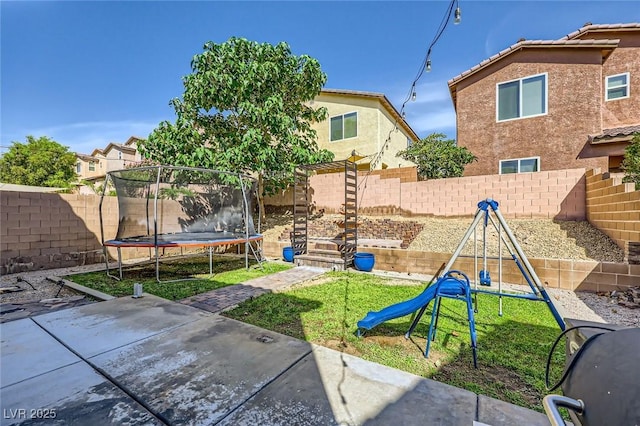 8091 Mosaic Sunrise Ln, Las Vegas, NV 89166 - fenced backyard with a trampoline, a playground, and a patio area
