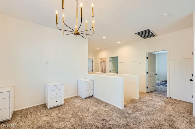 8091 Mosaic Sunrise Ln, Las Vegas, NV 89166 - unfurnished room featuring light colored carpet, a chandelier, and a smoke detector