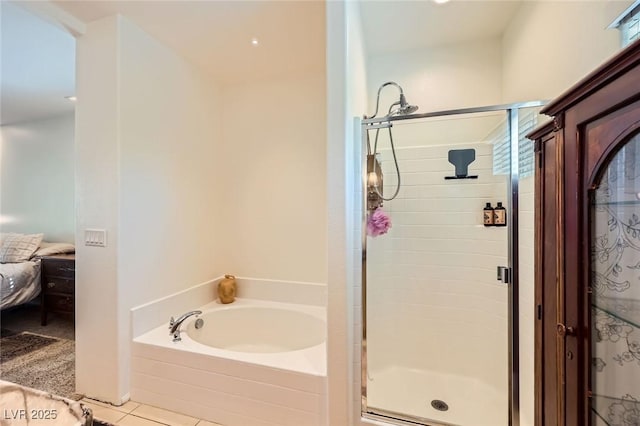 8091 Mosaic Sunrise Ln, Las Vegas, NV 89166 - ensuite bathroom with a stall shower, a garden tub, and tile patterned floors