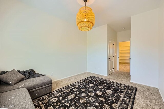8091 Mosaic Sunrise Ln, Las Vegas, NV 89166 - unfurnished living room featuring carpet and baseboards