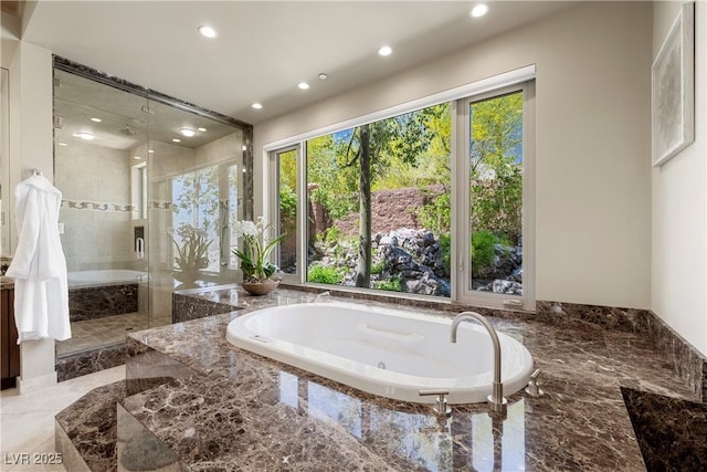 full bathroom with recessed lighting, a stall shower, marble finish floor, and a bath
