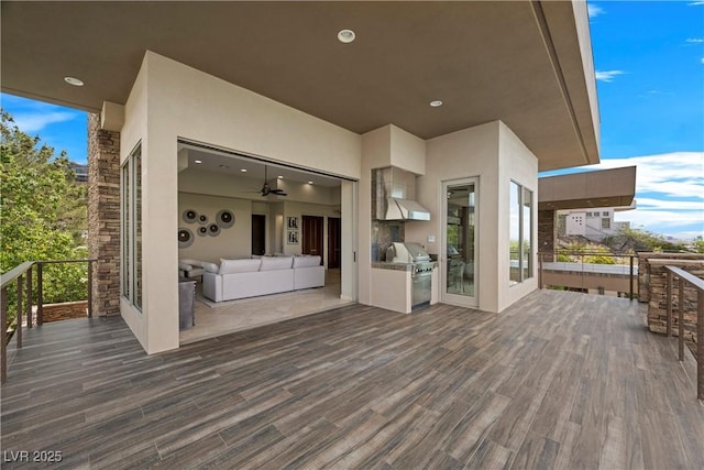 wooden terrace with area for grilling