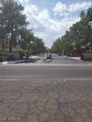 view of street featuring a gate