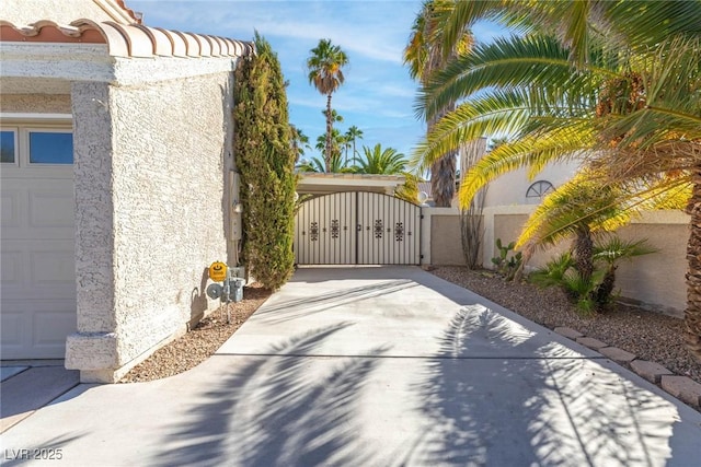 view of gate featuring fence