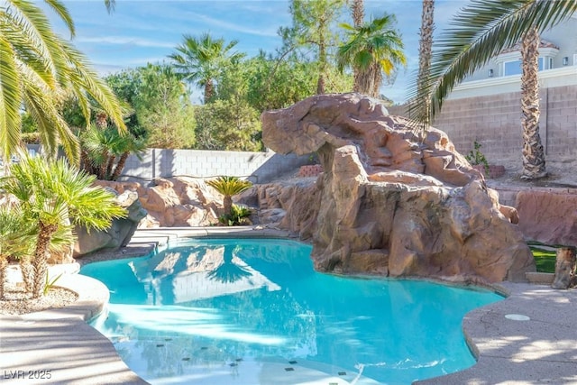 pool featuring fence