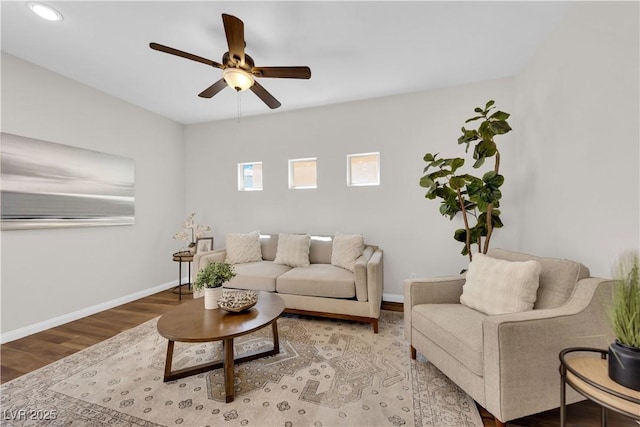 living room featuring baseboards, ceiling fan, recessed lighting, and wood finished floors