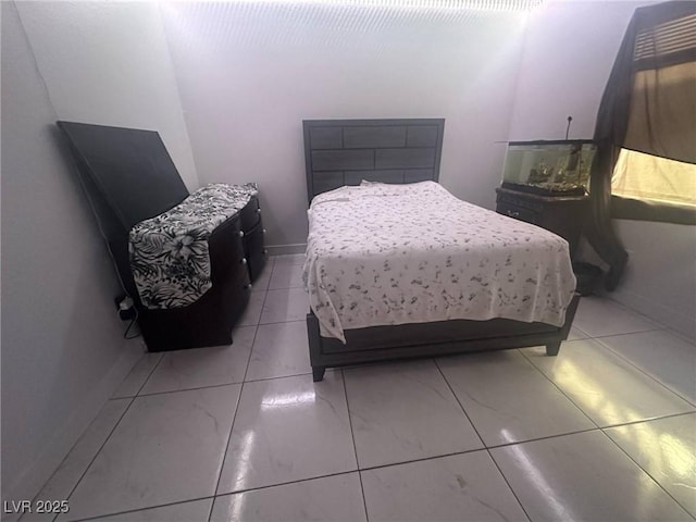 bedroom with baseboards