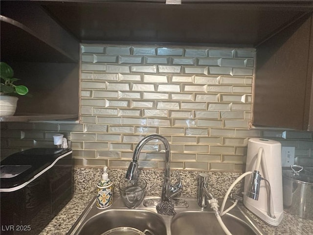 details with backsplash and a sink