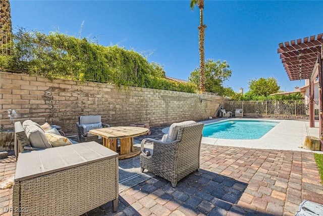 view of pool with a fenced in pool, a fenced backyard, and a patio area