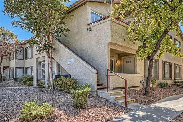 4955 Lindell Rd Unit 130, Las Vegas, NV 89118 - view of front of property with stucco siding