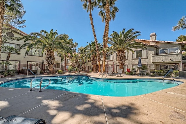 4955 Lindell Rd Unit 130, Las Vegas, NV 89118 - community pool featuring a patio area
