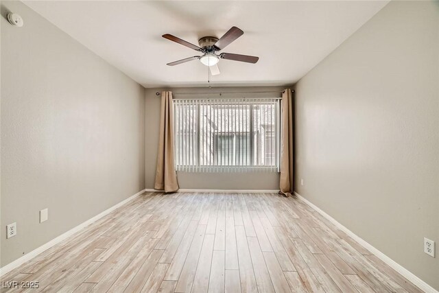 4955 Lindell Rd Unit 130, Las Vegas, NV 89118 - unfurnished room featuring a smoke detector, light wood-type flooring, ceiling fan, and baseboards