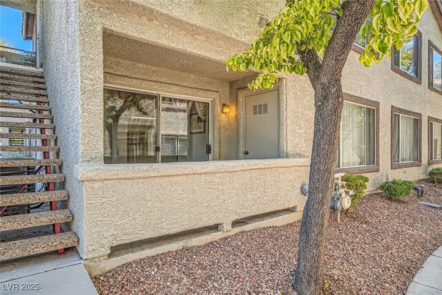 4955 Lindell Rd Unit 130, Las Vegas, NV 89118 - entrance to property featuring stucco siding