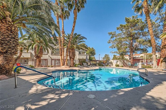 4955 Lindell Rd Unit 130, Las Vegas, NV 89118 - community pool with a patio