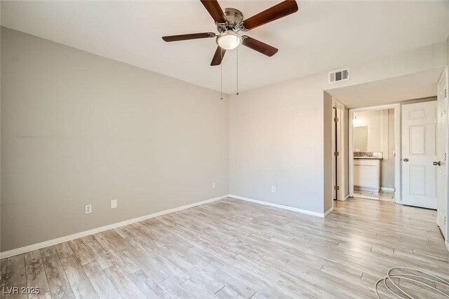 4955 Lindell Rd Unit 130, Las Vegas, NV 89118 - unfurnished room featuring a ceiling fan, light wood-style flooring, and baseboards